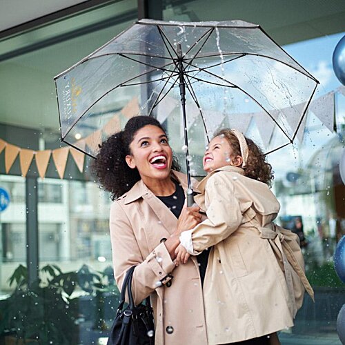 Additional Image 9 - a woman holding a child under an umbrella
