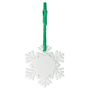 Additional Image 1 - a white snowflake with a green handle