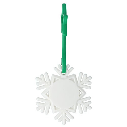 Additional Image 1 - a white snowflake with a green handle