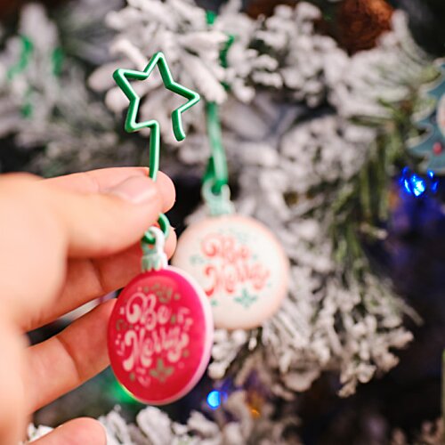 Additional Image 3 - a hand holding a christmas ornament