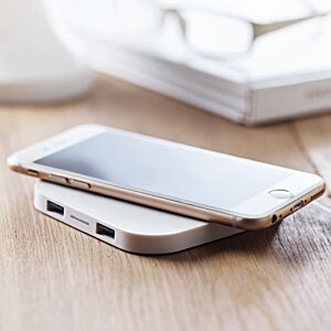 Additional Image 3 - a cell phone on a charging device