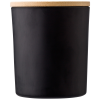 a black cup with a white rim