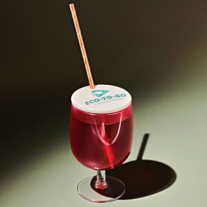 Additional Image 1 - a glass with a straw and a red liquid