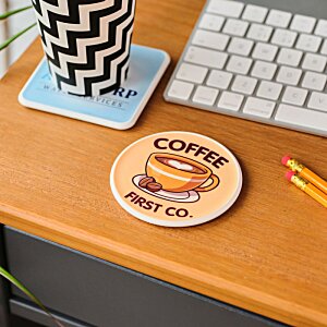 Additional Image 2 - a cup of coffee and a coaster on a desk