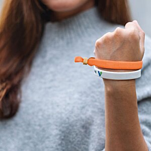 Additional Image 11 - a woman wearing a grey shirt and holding a toothbrush