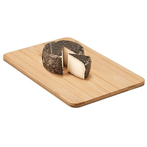 Additional Image 2 - a piece of cheese on a cutting board