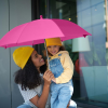 Additional Thumbnail Image 1 - a woman holding a child under an umbrella