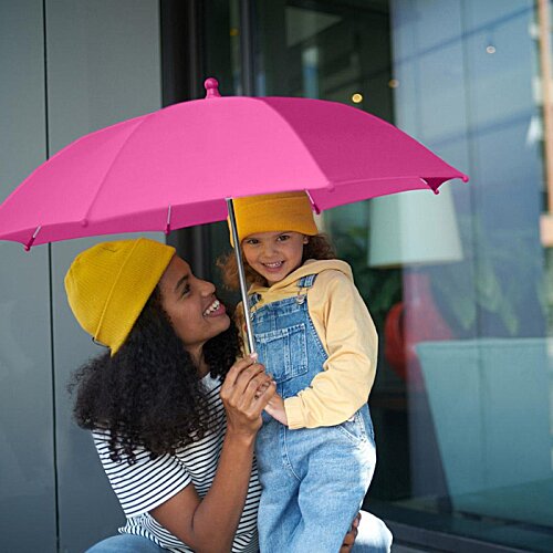 Additional Image 1 - a woman holding a child under an umbrella