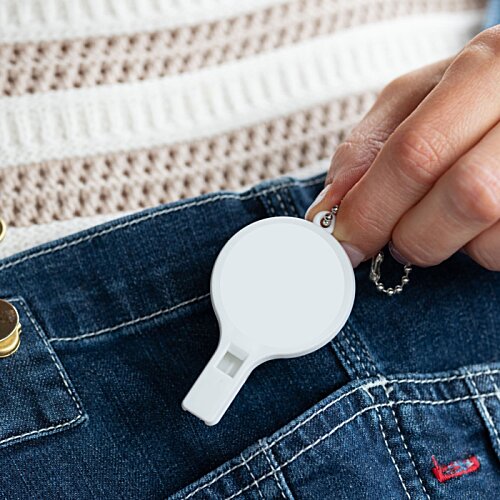 Additional Image 2 - a person holding a whistle in their pocket