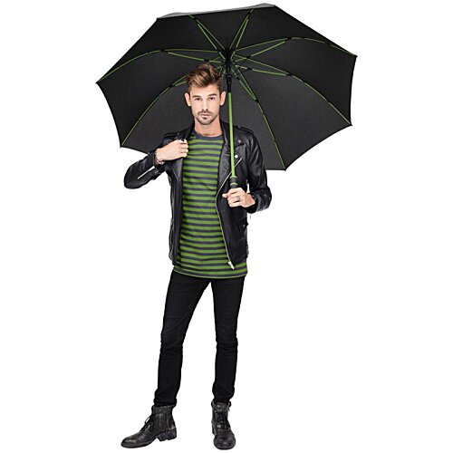 Additional Image 8 - a man holding an umbrella