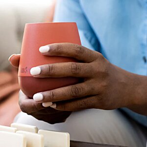 Additional Image 2 - a person holding a cup