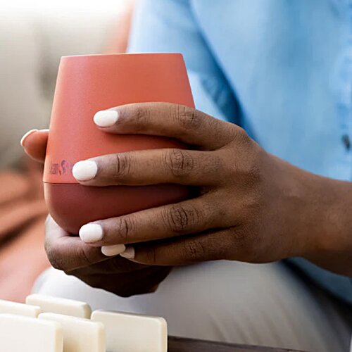 Additional Image 2 - a person holding a cup