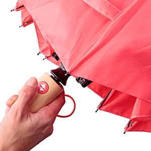 Additional Image 3 - a hand holding a red umbrella