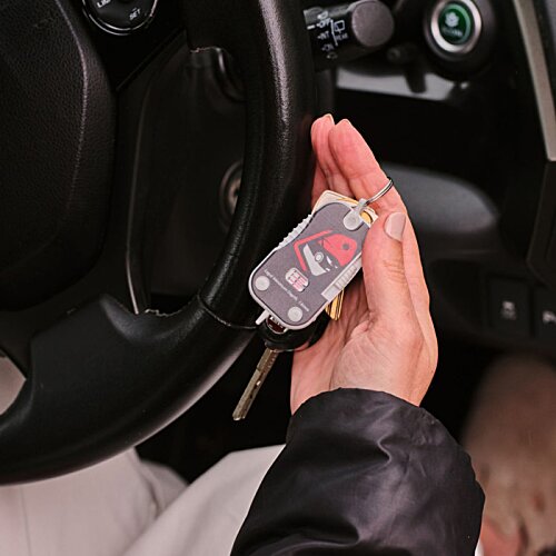 Additional Image 2 - a person holding a remote control