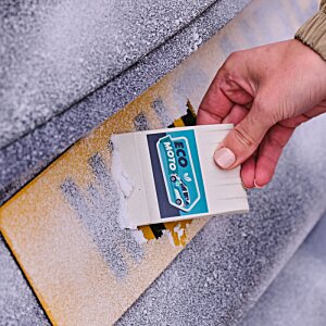 Additional Image 4 - a hand holding a piece of paper