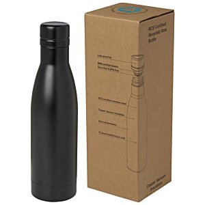 Additional Image 2 - a black bottle next to a cardboard box