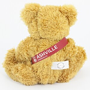 Additional Image 1 - a stuffed bear with a red ribbon