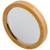 a round mirror with a wooden frame