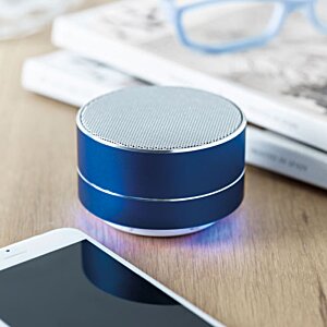 Additional Image 2 - a blue and white round object on a table
