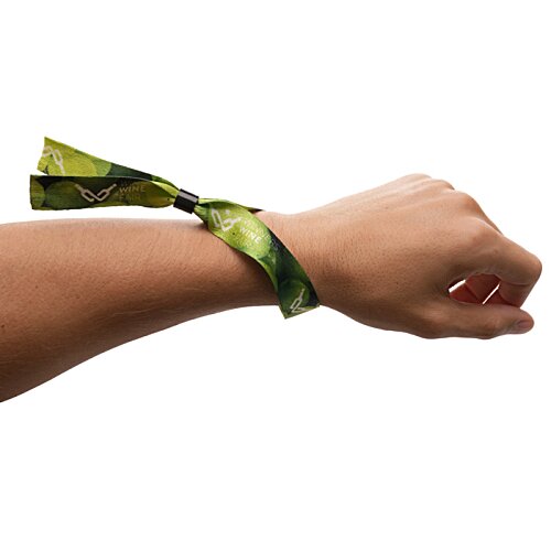 Additional Image 3 - a hand with a green band around it