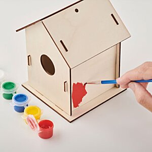 Additional Image 4 - a hand painting a birdhouse