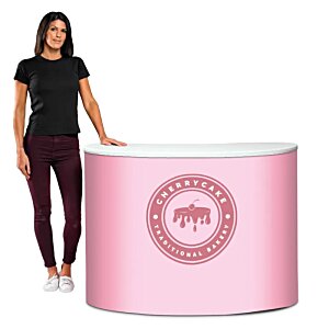 Additional Image 1 - a woman standing next to a pink cylinder