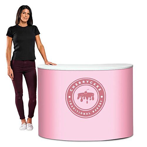 Additional Image 1 - a woman standing next to a pink cylinder