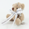 a stuffed animal with a bow