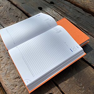 Additional Image 1 - an open book on a wood surface