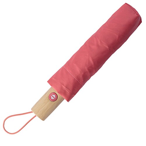 Additional Image 1 - a pink umbrella with a wooden handle