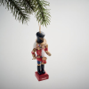 a toy nutcracker from a tree branch