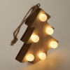 a wooden christmas tree with lights