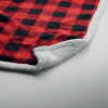 a red and black plaid blanket