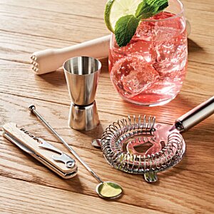 Additional Image 5 - a glass with a drink and a slice of cucumber on top