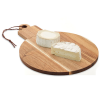 a round wooden board with a couple of white cheeses on it