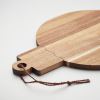 a close up of a wood cutting board