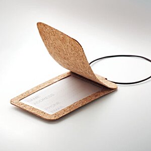 Additional Image 1 - a small rectangular object with a rubber band