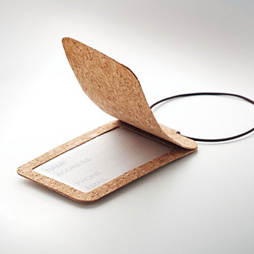 Additional Image 1 - a small rectangular object with a rubber band