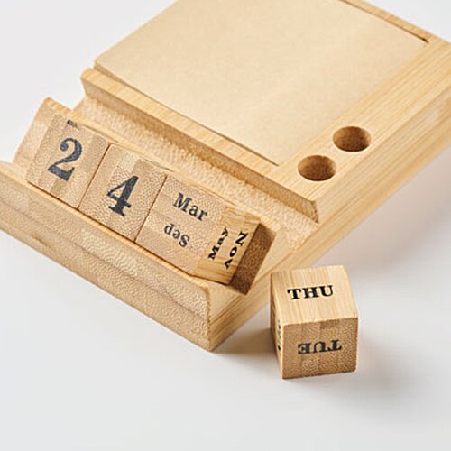 Additional Image 3 - a wooden block with numbers on it
