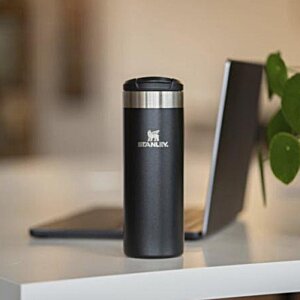 Additional Image 4 - a black cylindrical object on a white surface