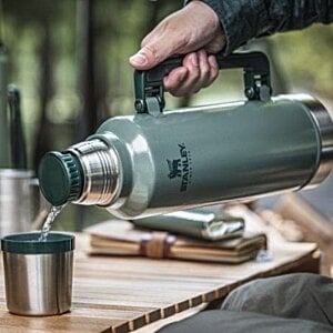Additional Image 4 - a person pouring liquid into a cup