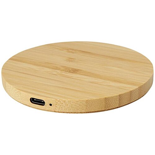 Additional Image 2 - a round wooden surface with a black cord