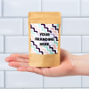Additional Image 3 - a hand holding a small package