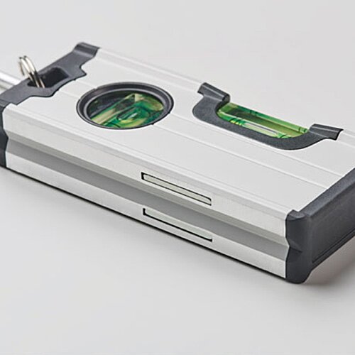 Additional Image 3 - a silver rectangular object with a green circle