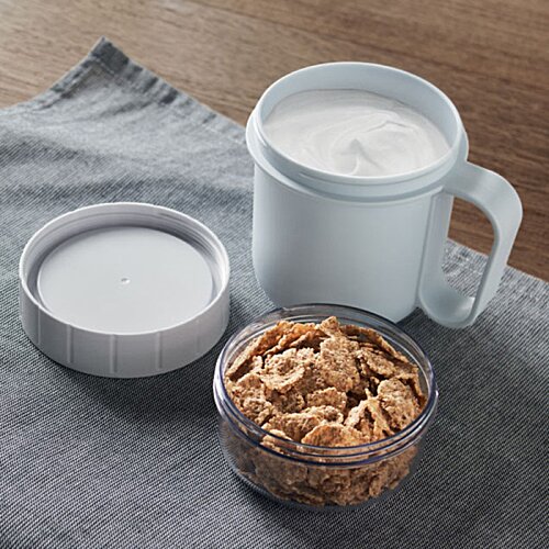 Additional Image 2 - a bowl of cereal and milk on a table