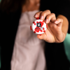 Additional Thumbnail Image 3 - a person holding a red and white chip