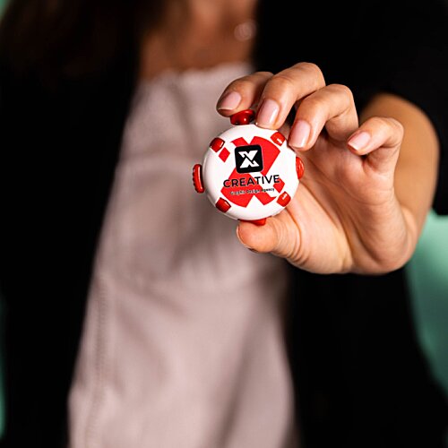 Additional Image 3 - a person holding a red and white chip
