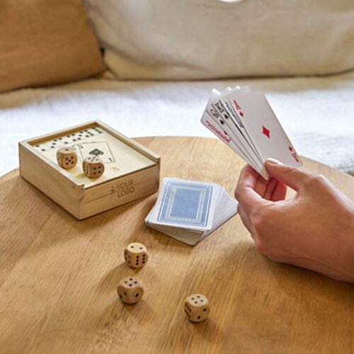 Additional Image 1 - a hand holding a card with a deck of cards and a box of chips