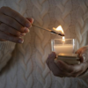 Additional Thumbnail Image 10 - a person holding a lit candle