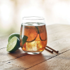 Additional Thumbnail Image 3 - a glass of liquid with ice and a lime slice on a table